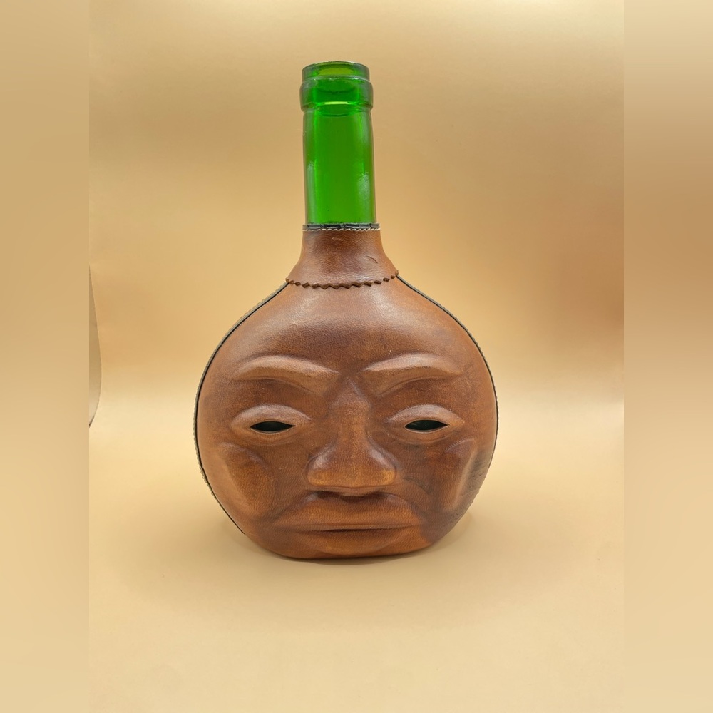 628 Vintage Leather-Wrapped Demijohn with Embossed‎ Face  Green Glass Bottle